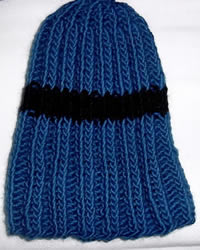 Blue ribbed hat with a black stripe