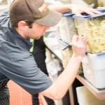 Labeling french fries before the head back down to the cooler